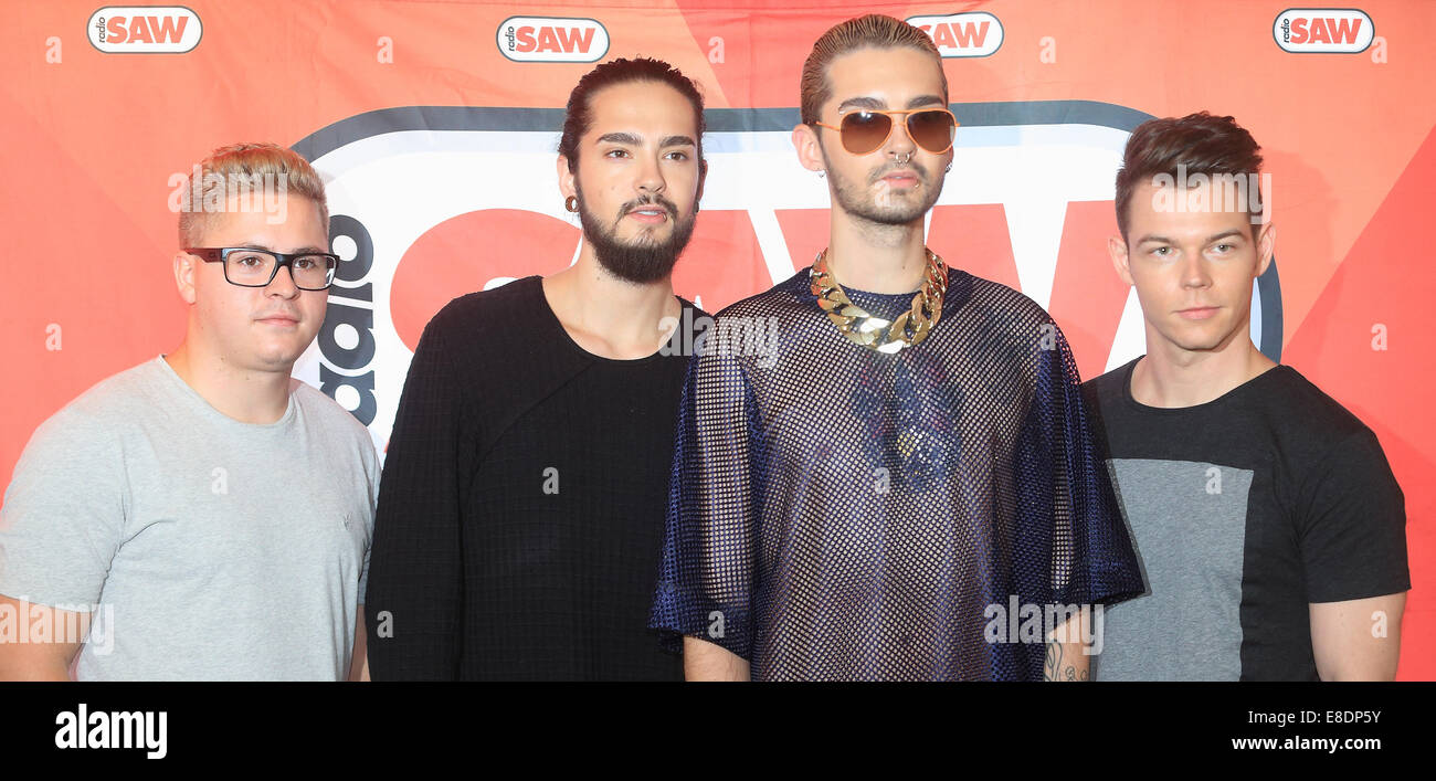 Magdeburg, Germany. 05th Oct, 2014. Musicians Gustav Schaefer, (L-R), Tom Kaulitz, Bill Kaulitz and Georg Listing of the band 'Tokio Hotel' pose after a listening concert at the radio station SAW in Magdeburg, Germany, 05 October 2014. Photo: Jens Wolf/dpa/Alamy Live News Stock Photo