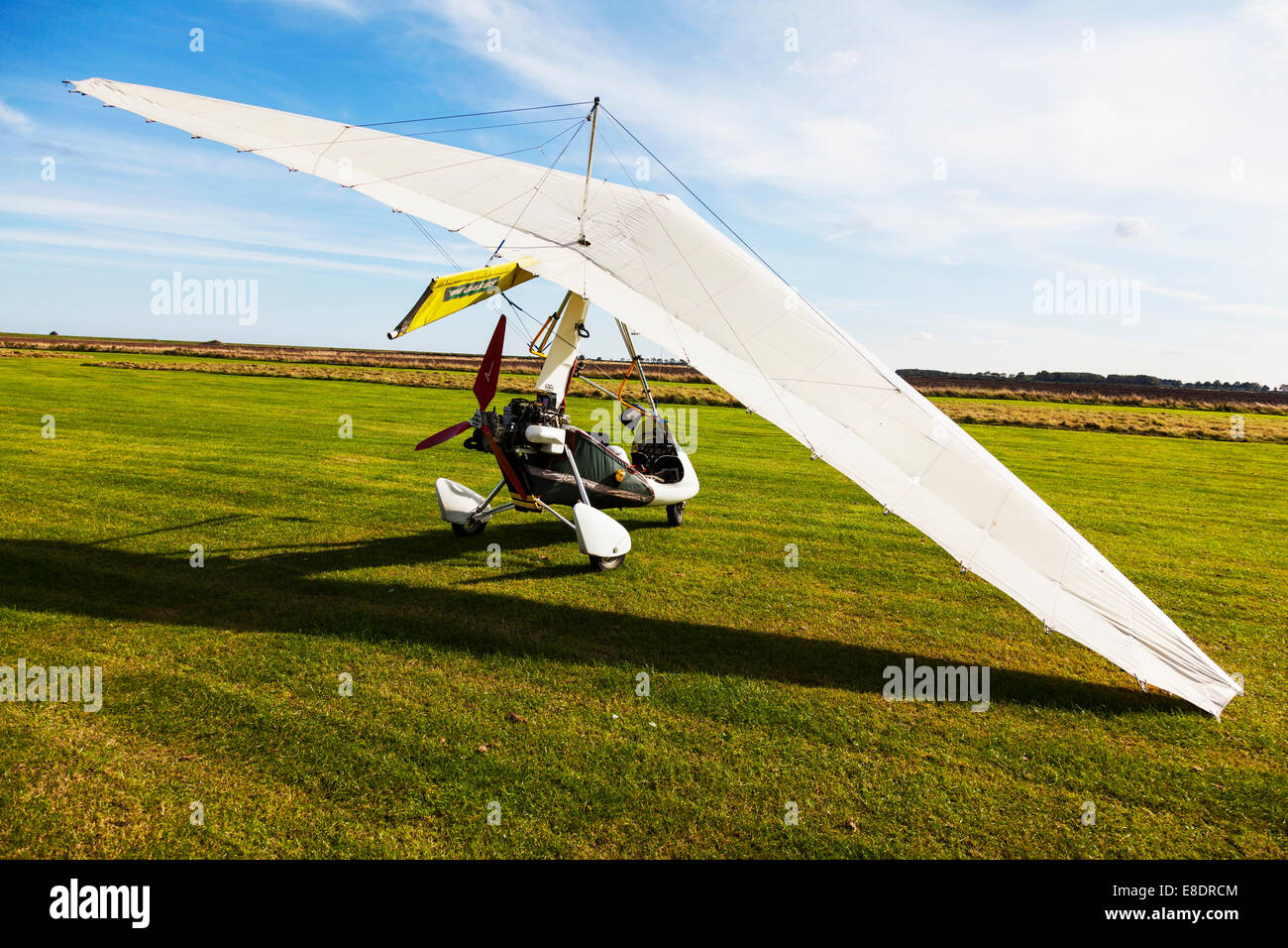 flex wing flexwing microlight single-seat flying machine on ground empty hobby pastime leisure activity Stock Photo