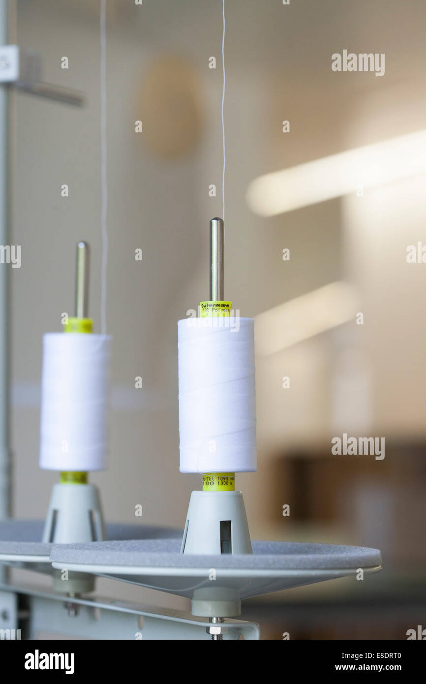 cotton reel on a sewing machine Stock Photo Alamy