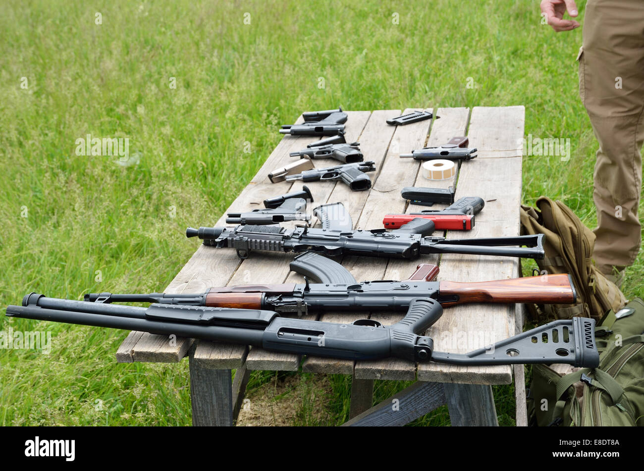 Firearm on the table outdoors Stock Photo