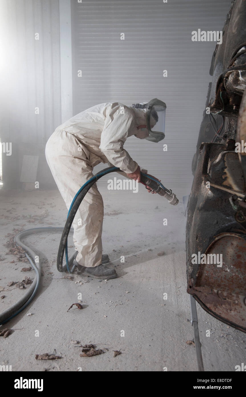 Media blasting a classic car body to strip it back to bare metal. Rover