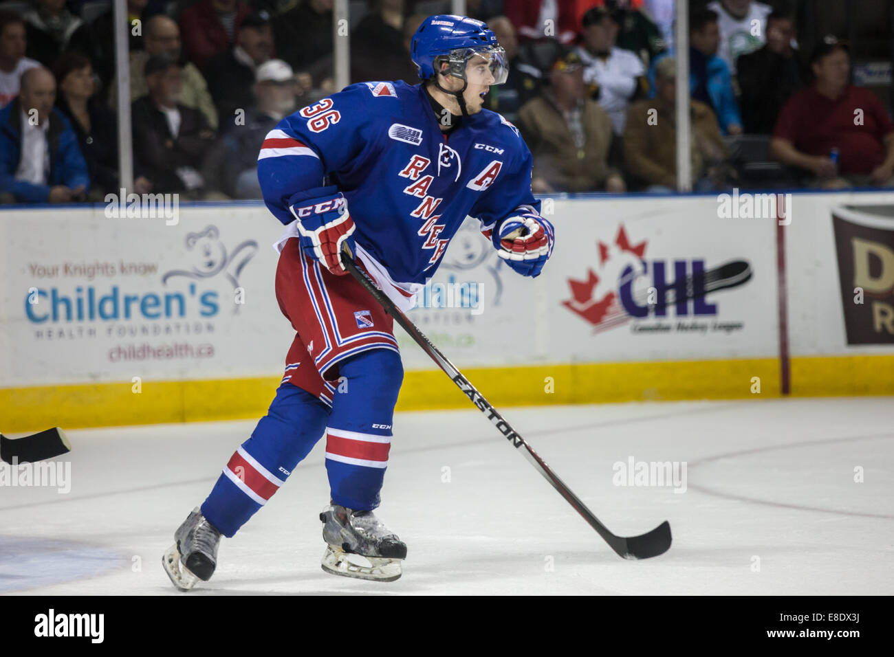 October 3, 2014.  Curtis Meighan (36) of the Kitchener Rangers follows the play during a game between the London Knights and the Stock Photo