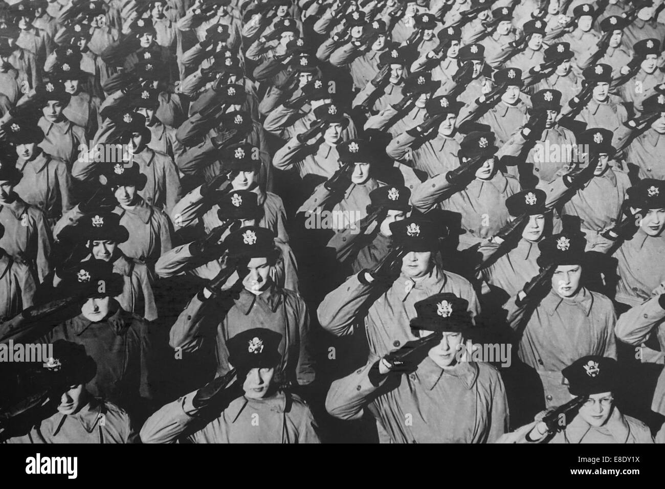 Word War II Two U.S. Army Nurse Corps 1940s Saluting at a field hospital in the European Theater of Operations Stock Photo