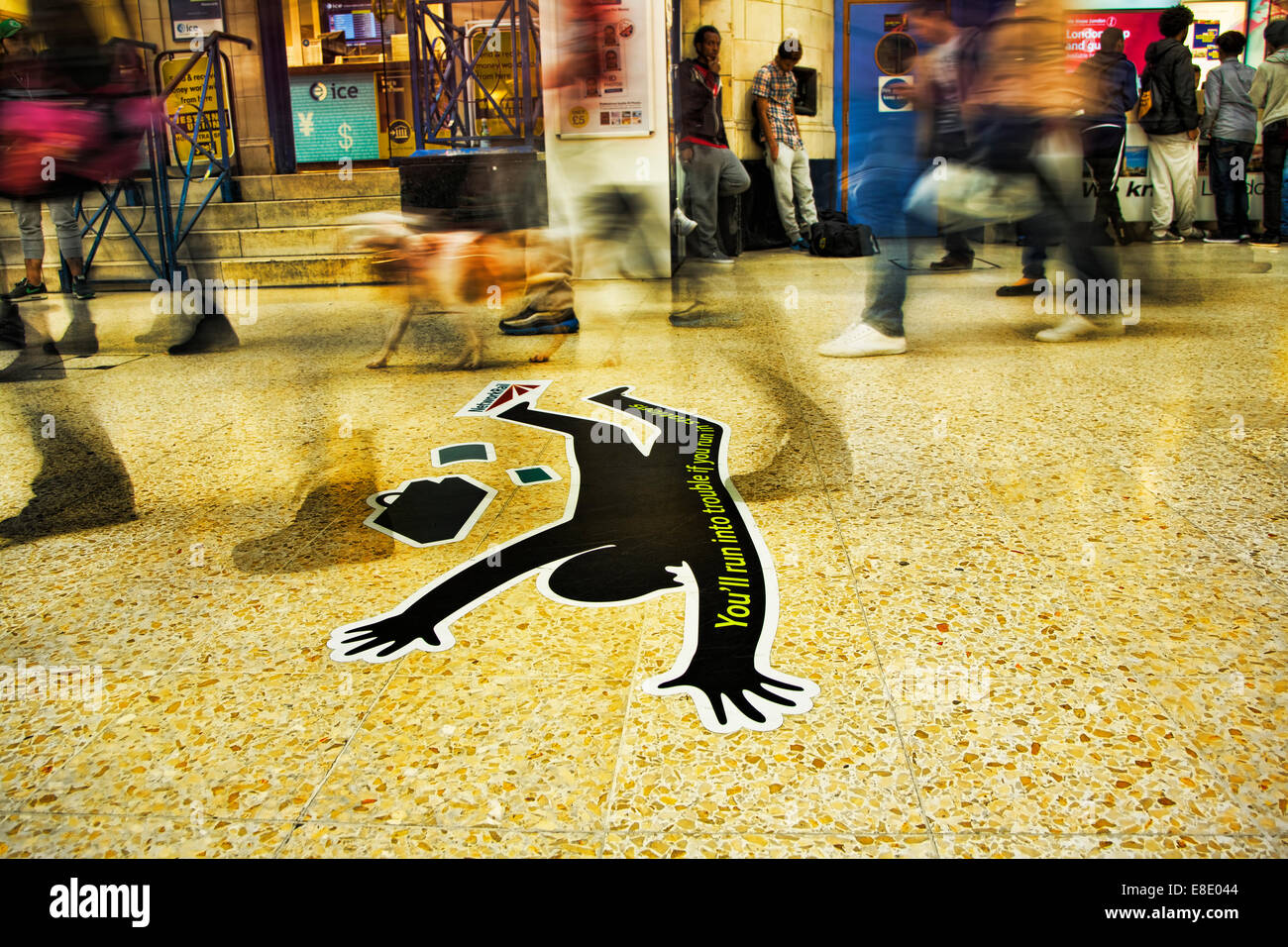 A warning sign telling people not to run in railway stations. Stock Photo