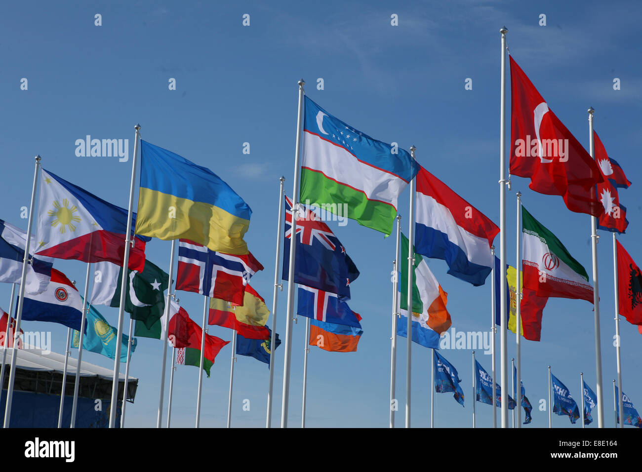 Many Flags blowing in the wind Stock Photo