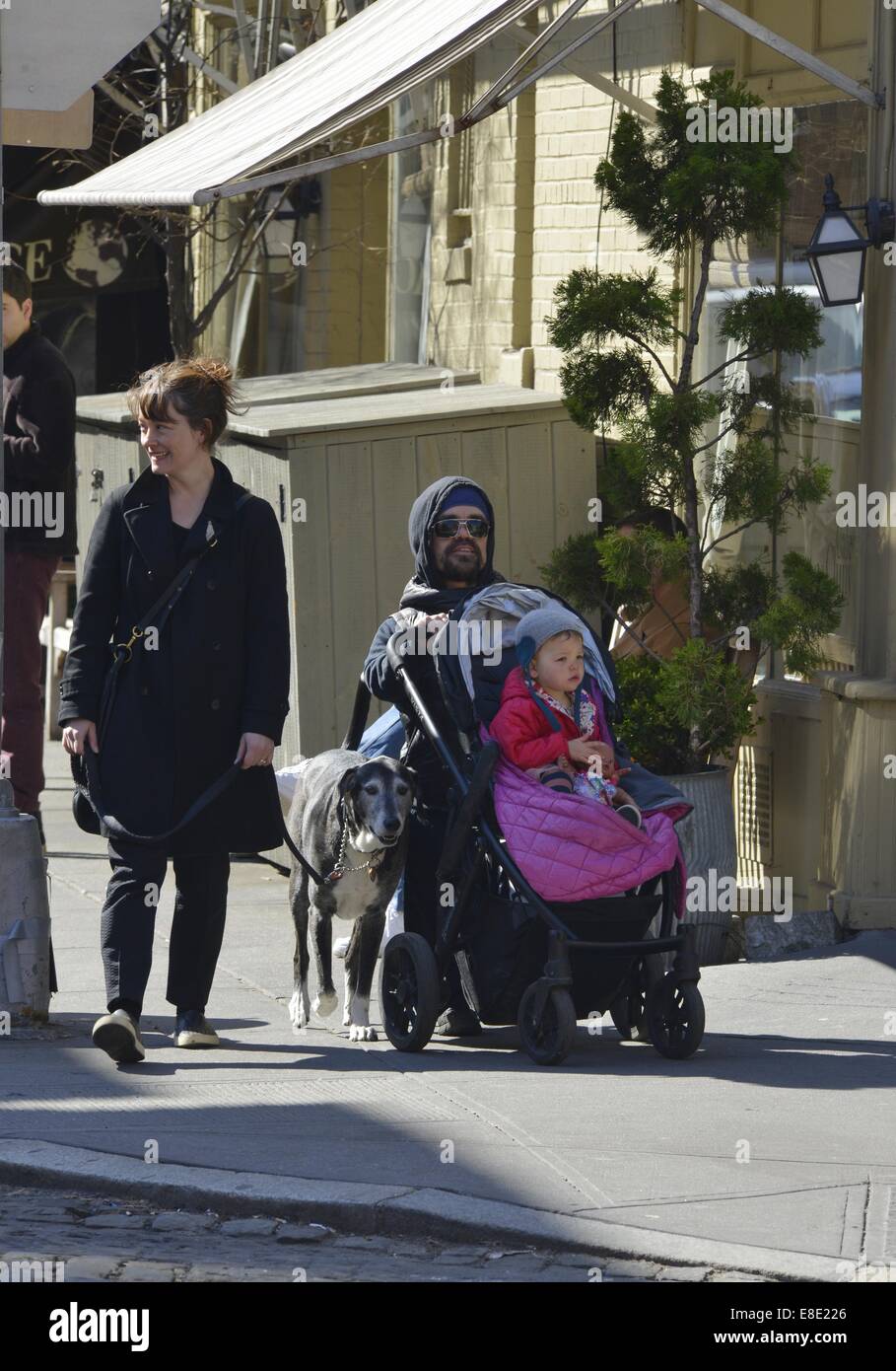 Peter Dinklage and family out and about in Manhattan  Featuring: Peter Dinklage,Erica Schmidt,Zelig Dinklage Where: New York City, New York, United States When: 03 Apr 2014 Stock Photo