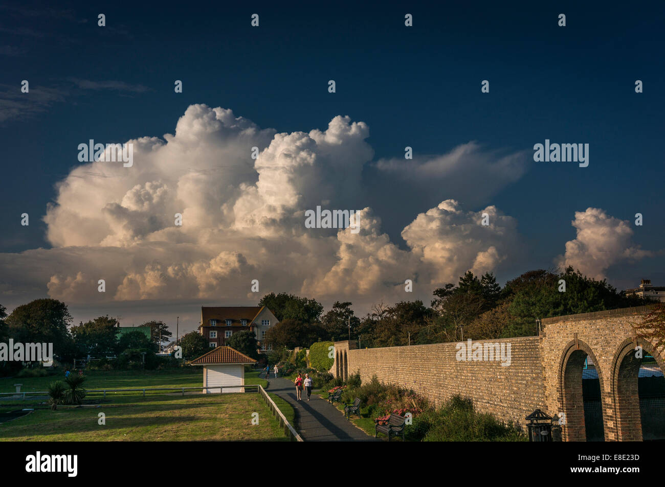 Dramatic evening clouds over Denton Gardens, Worthing, West Sussex, UK Stock Photo