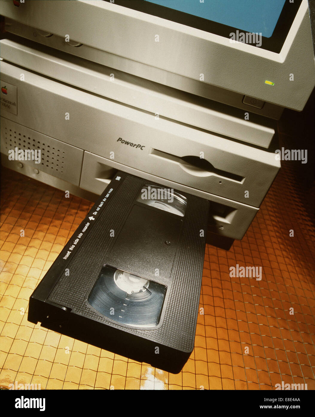 Hamburg, Germany, video tape in front of a CD-ROM drive of a Power PC Stock Photo