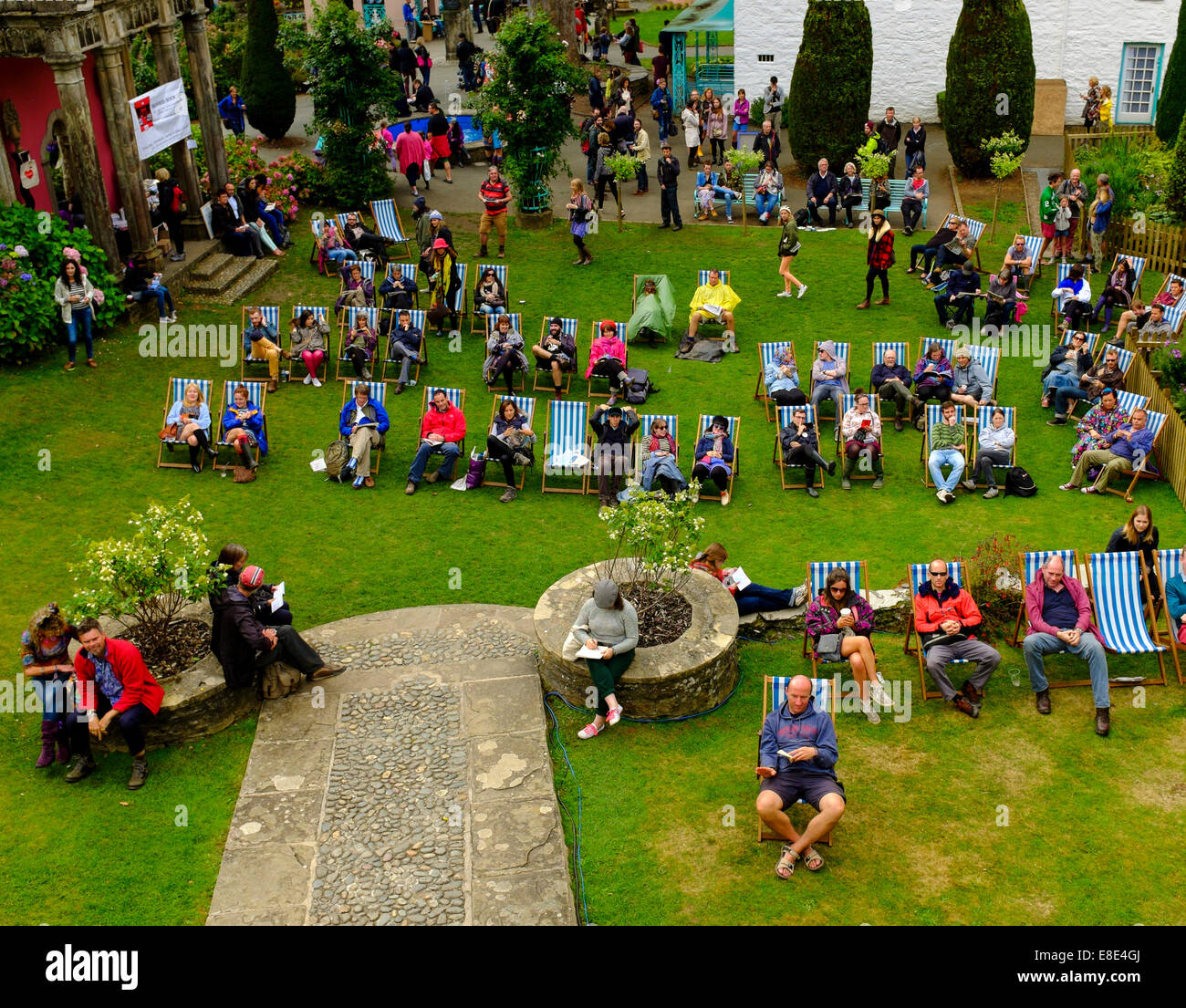 People seated awaiting a performance in the square. 'Festival No.6'. 6th September 2014 in Portmeirion, North Wales, UK. Stock Photo