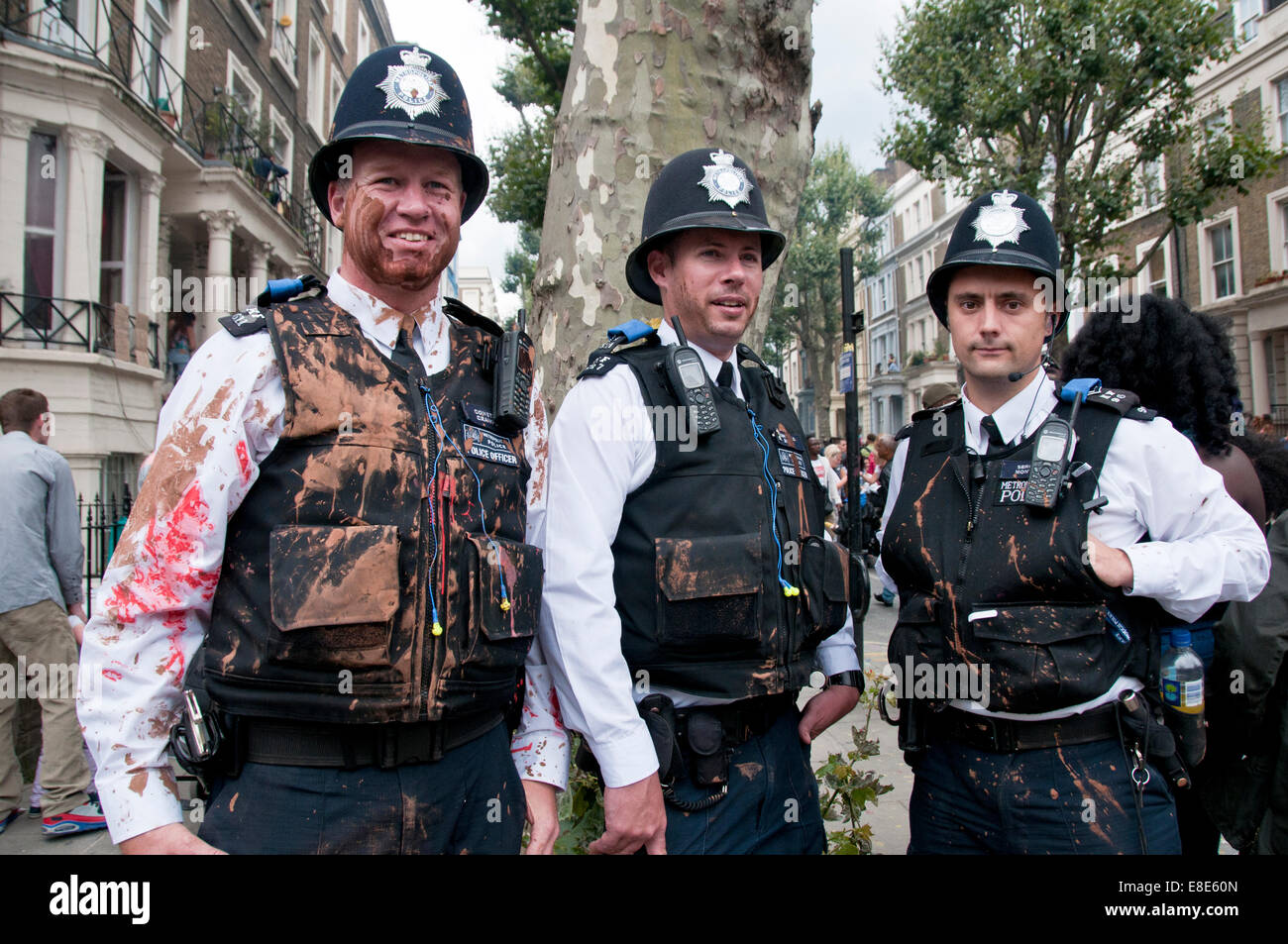 Police splashed with paint at Annual Notting Hill Carnival in London 2014 Stock Photo Alamy