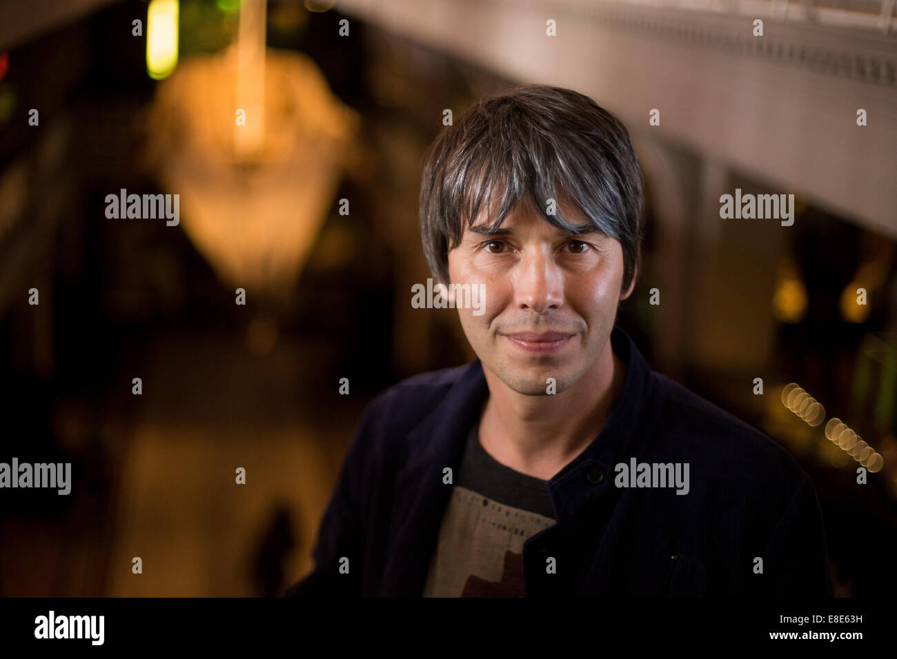 Professor Brian Cox poses for pictures during a photocall for the opening of the Nature's Library exhibtion at Manchester Museum Stock Photo