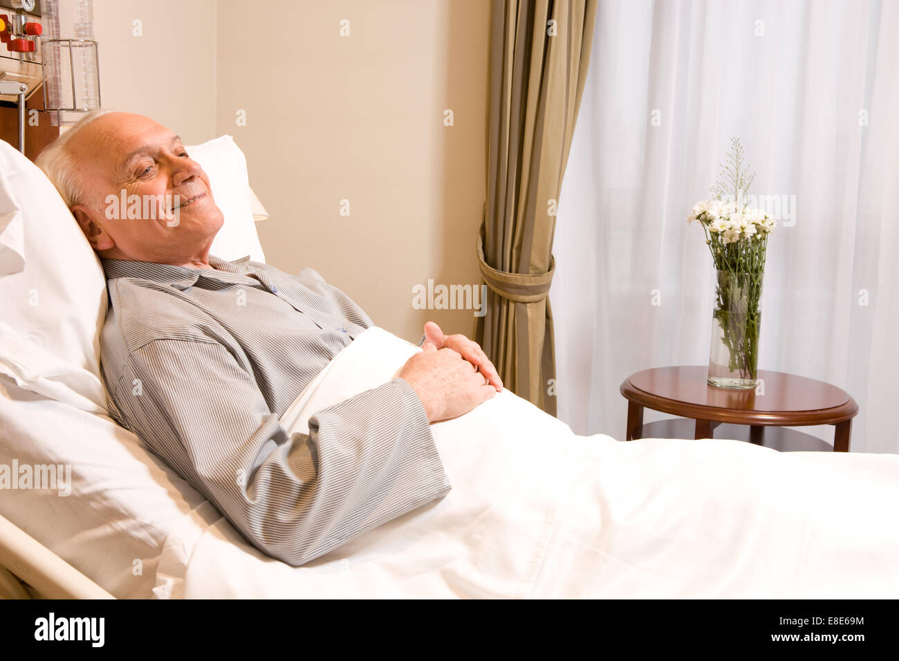 Elderly in bed Stock Photo Alamy