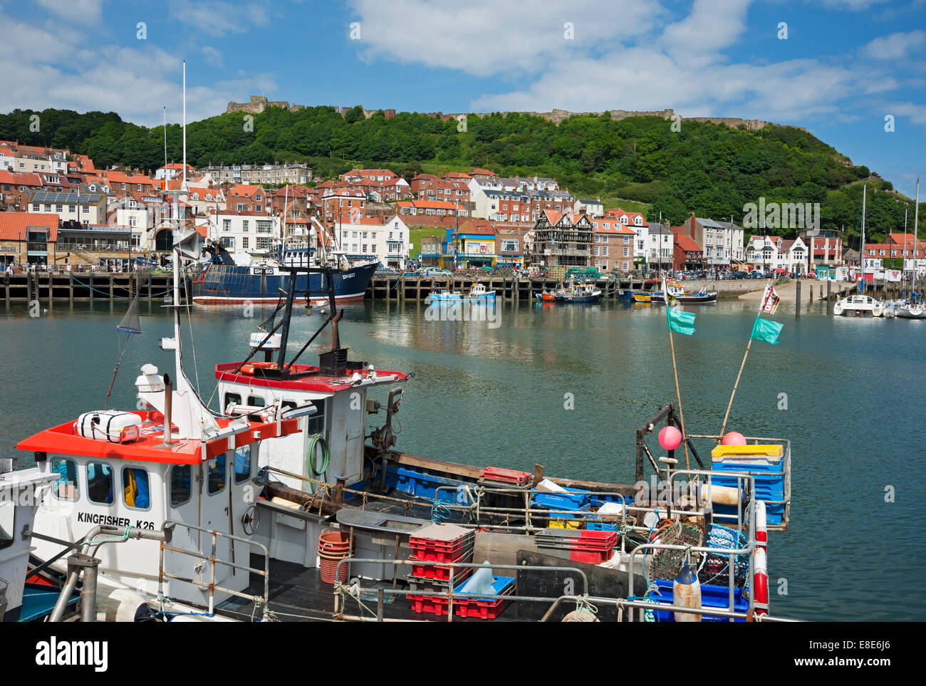Fishing boat boats in the harbour in summer Scarborough seafront town resort North Yorkshire England UK United Kingdom GB Great Britain Stock Photo