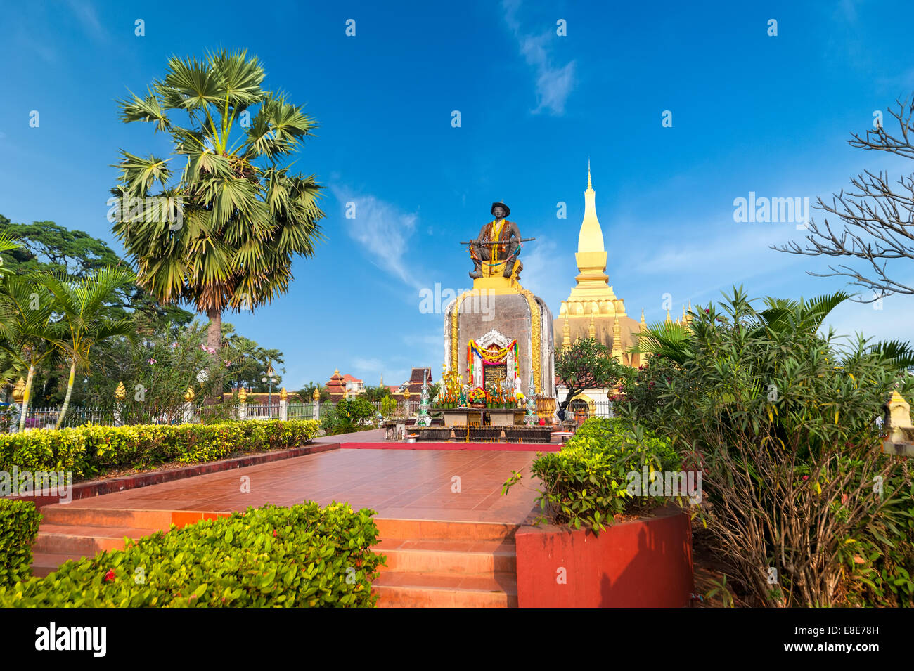 King Setthathirath statue and Pha That Luang Pagoda Vientiane, Laos travel landscape and destinations Stock Photo