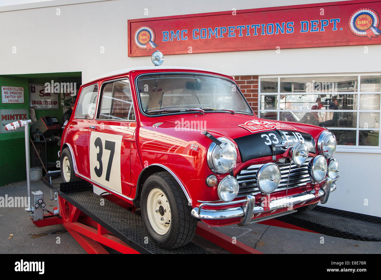 Classic vintage red BMC Mini Cooper racing car at the Goodwood Revival 2014, West Sussex, UK Stock Photo