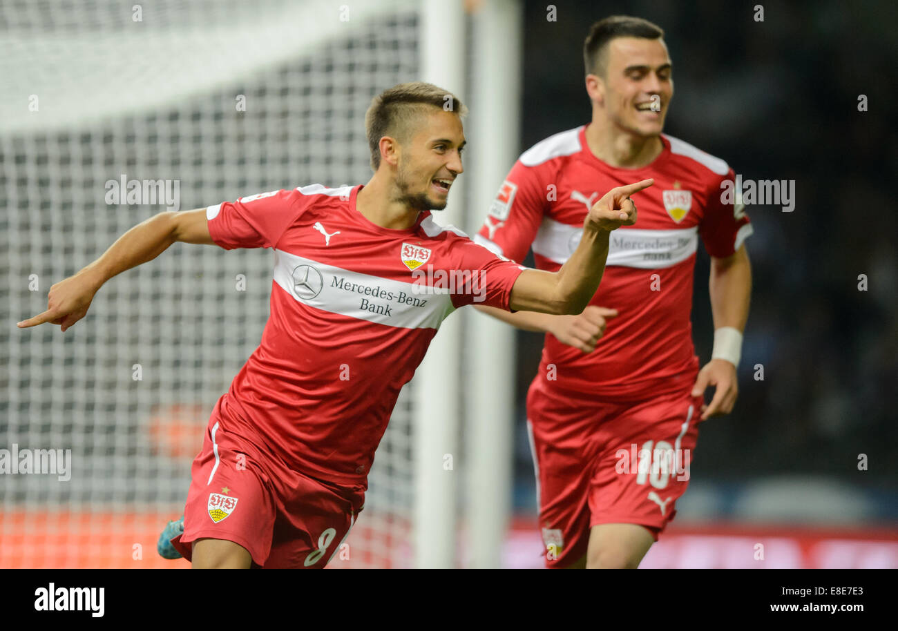 Berlin, Germany. 03rd Oct, 2014. Stuttgart's Moritz Leitner (L) cheers after his 1:0 goal with Filip Kostic during the Bundesliga Day 7 soccer match between Hertha BSC and VfB Stuttgart at Olympiastadion in Berlin, Germany, 03 October 2014. Photo: Thomas Eisenhuth/dpa - NO WIRE SERVICE -/dpa/Alamy Live News Stock Photo