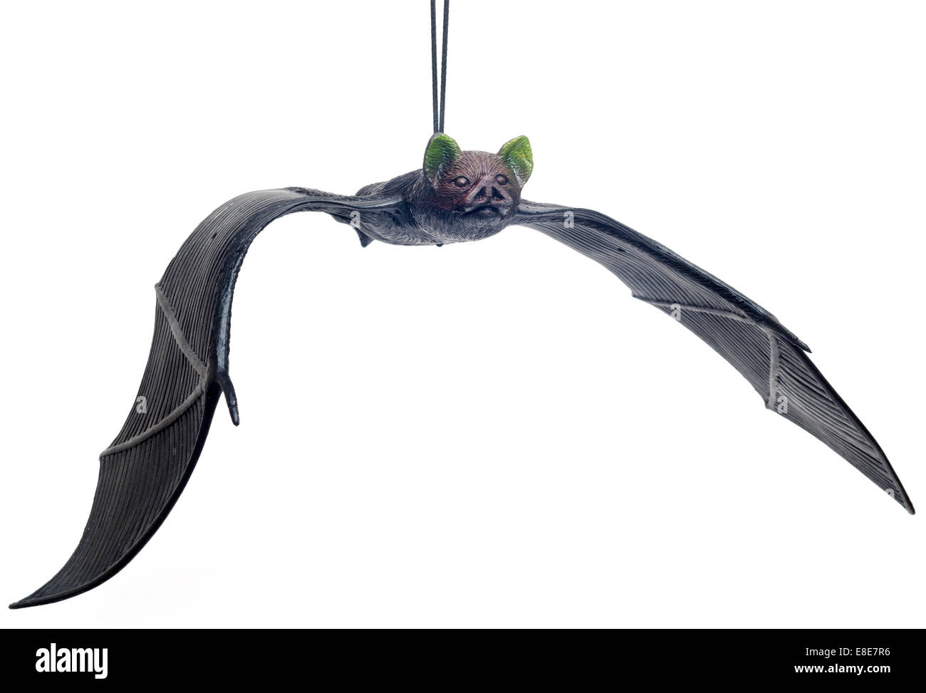 Toy bat on elastic Stock Photo