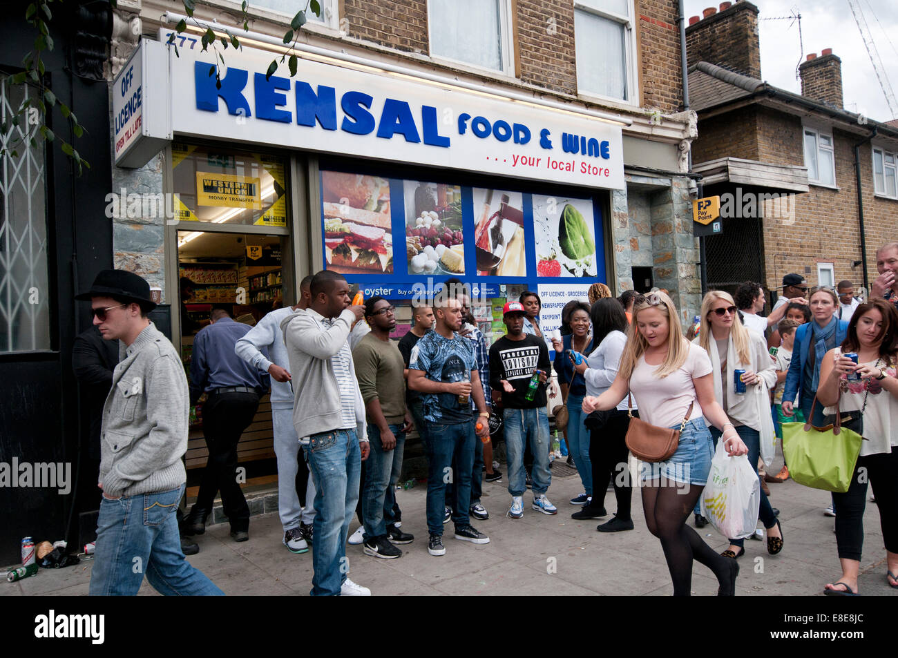 Off Licence and local shop in Kensal Green with young people hanging