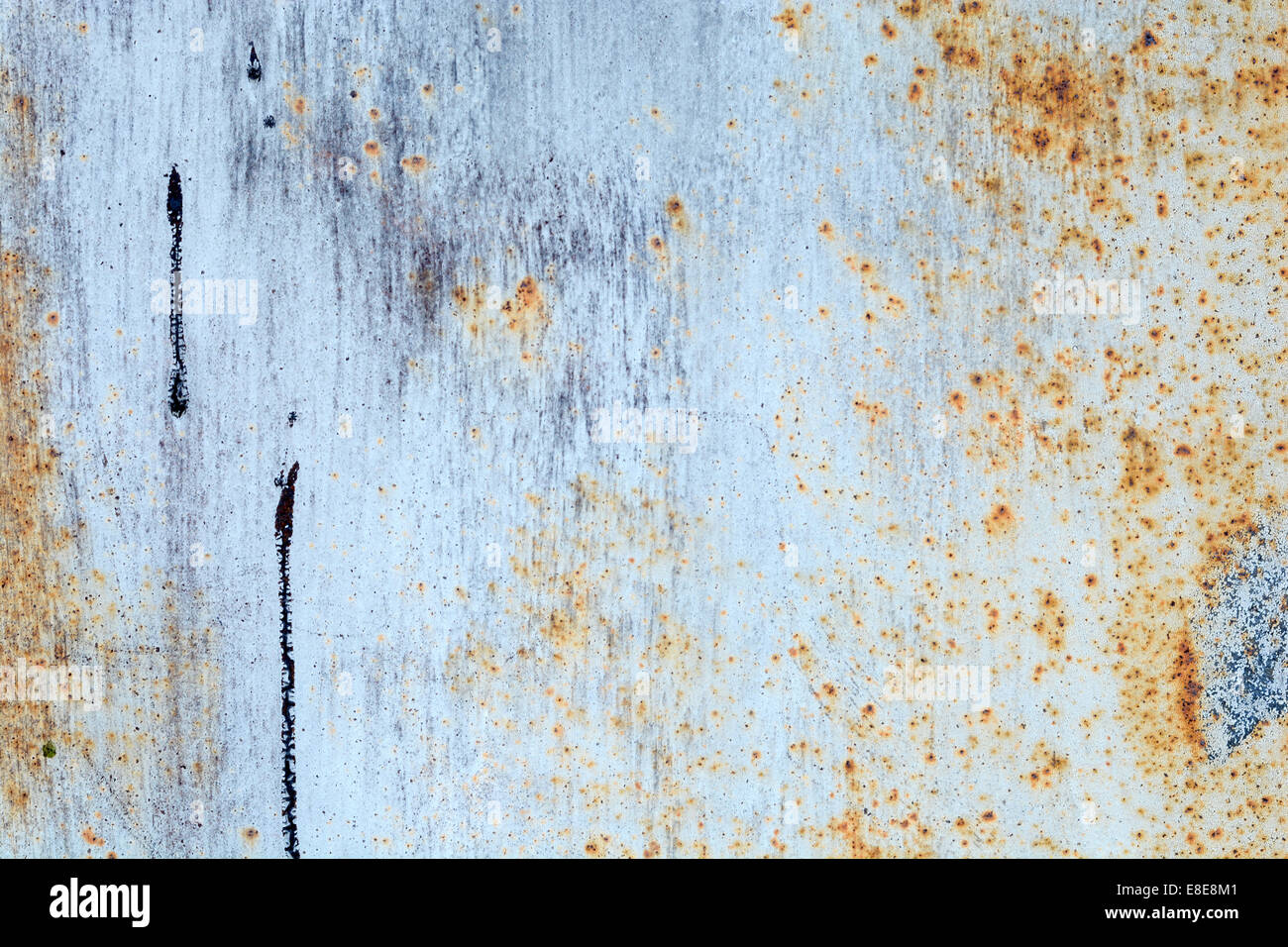 scratched ripped metal plating, grunge background Stock Photo