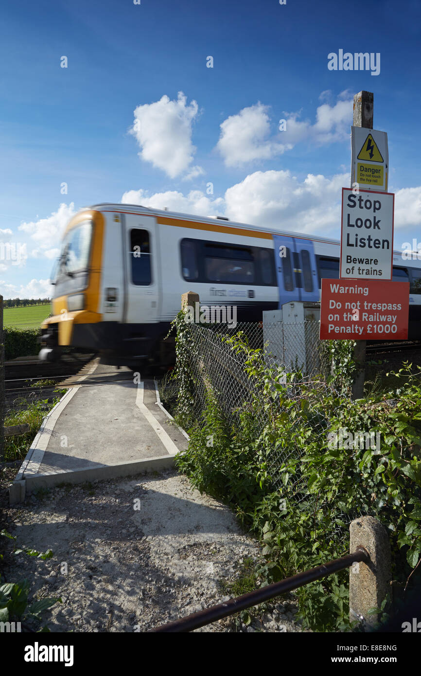 Walkers Using A Railway Foot Crossing Near Eynsford Kent UK Stock 