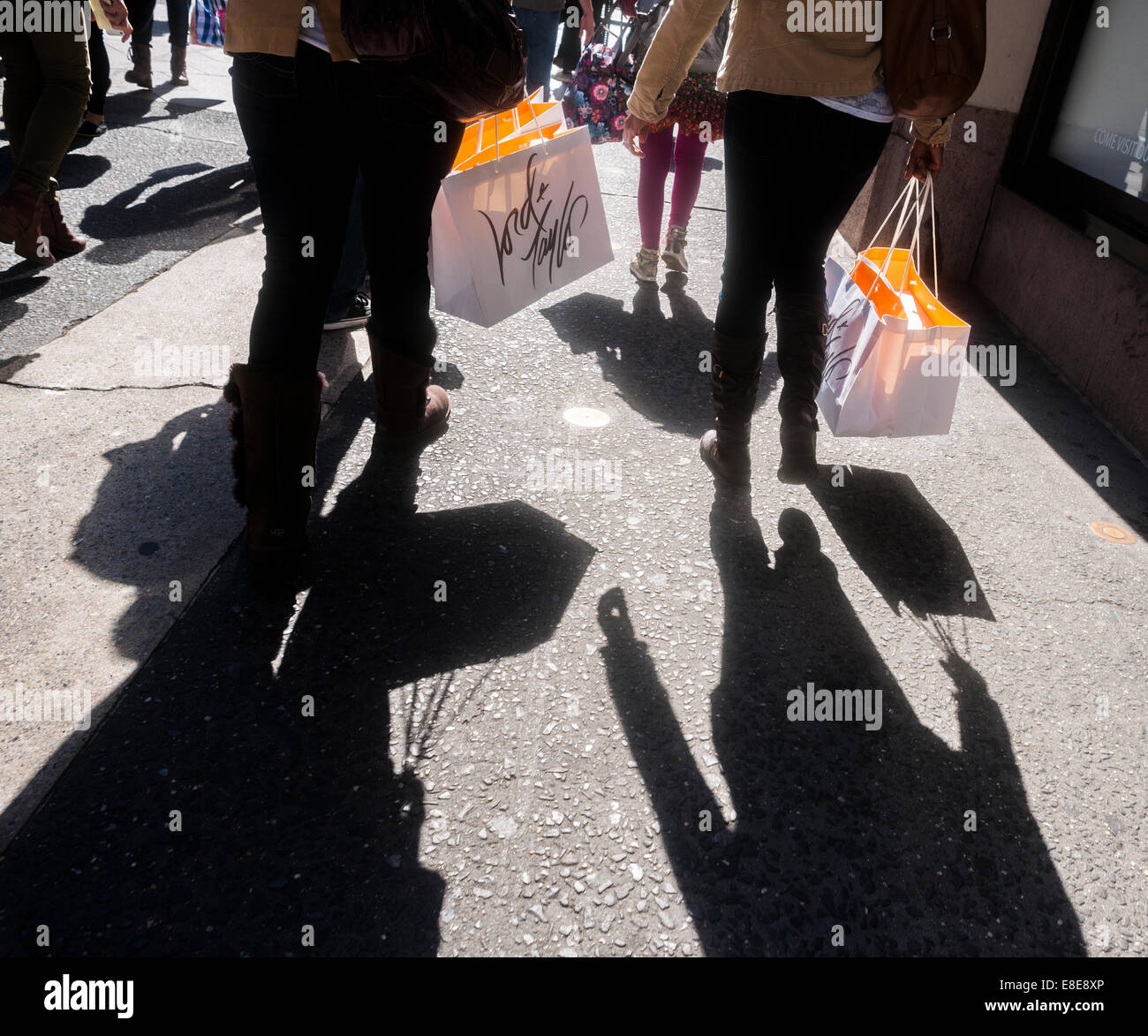 Shoppers on Fifth Avenue in New York with Lord & Taylor shopping bags on Friday, October 3, 2014. (© Richard B. Levine) Stock Photo