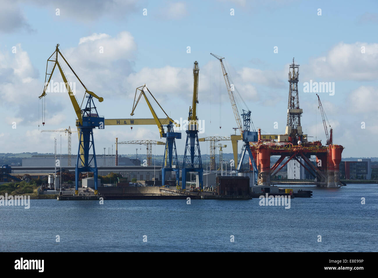 The Harland and Wolff gantry cranes plus the Borgny Dolphin oil rig platform in Belfast Harbour Stock Photo