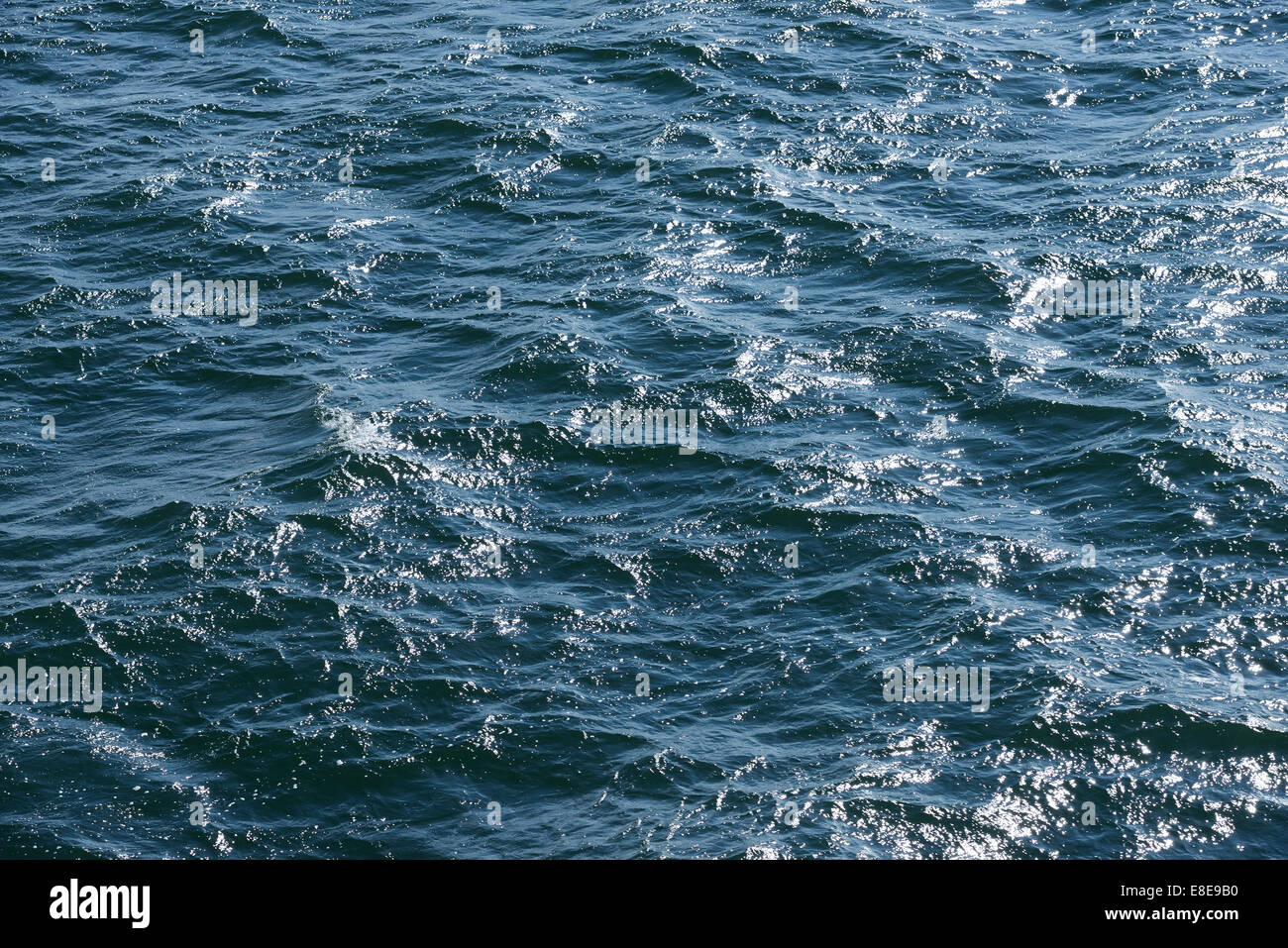 Blue calm sea pattern with sunshine Stock Photo