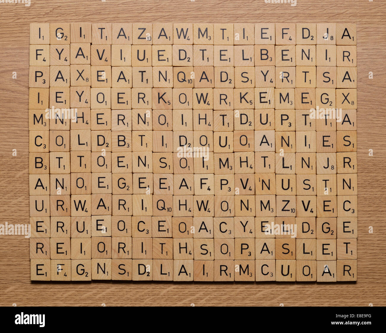 Grid of wooden Scrabble letter tiles Stock Photo