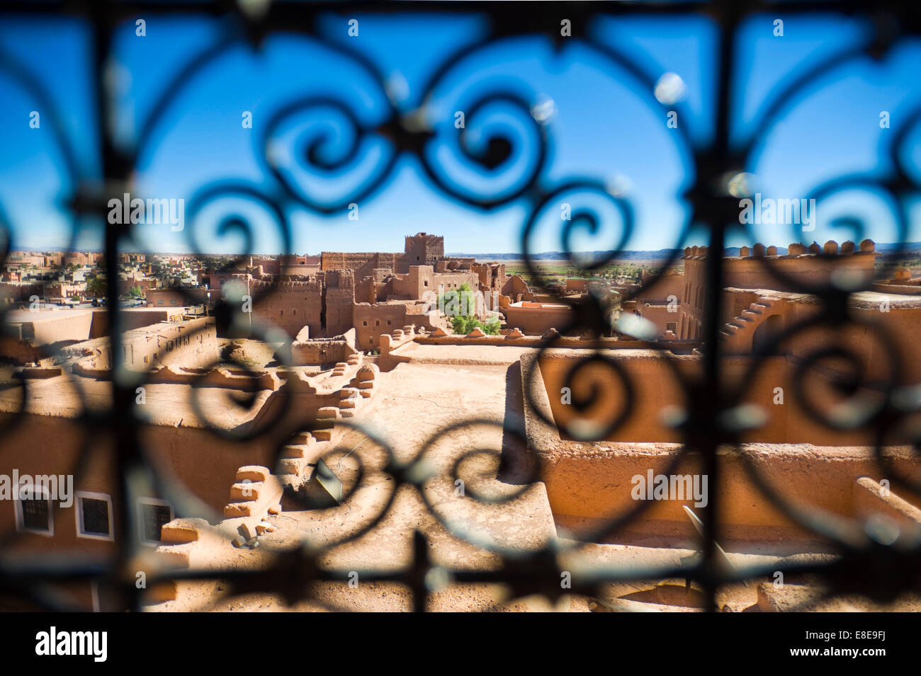 Horizontal view through the ornamental railings of Kasbah Taourirt in Ouarzazate. Stock Photo