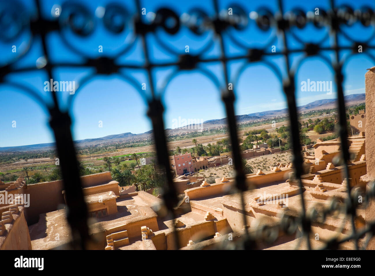 Horizontal view through the ornamental railings of Kasbah Taourirt in Ouarzazate. Stock Photo