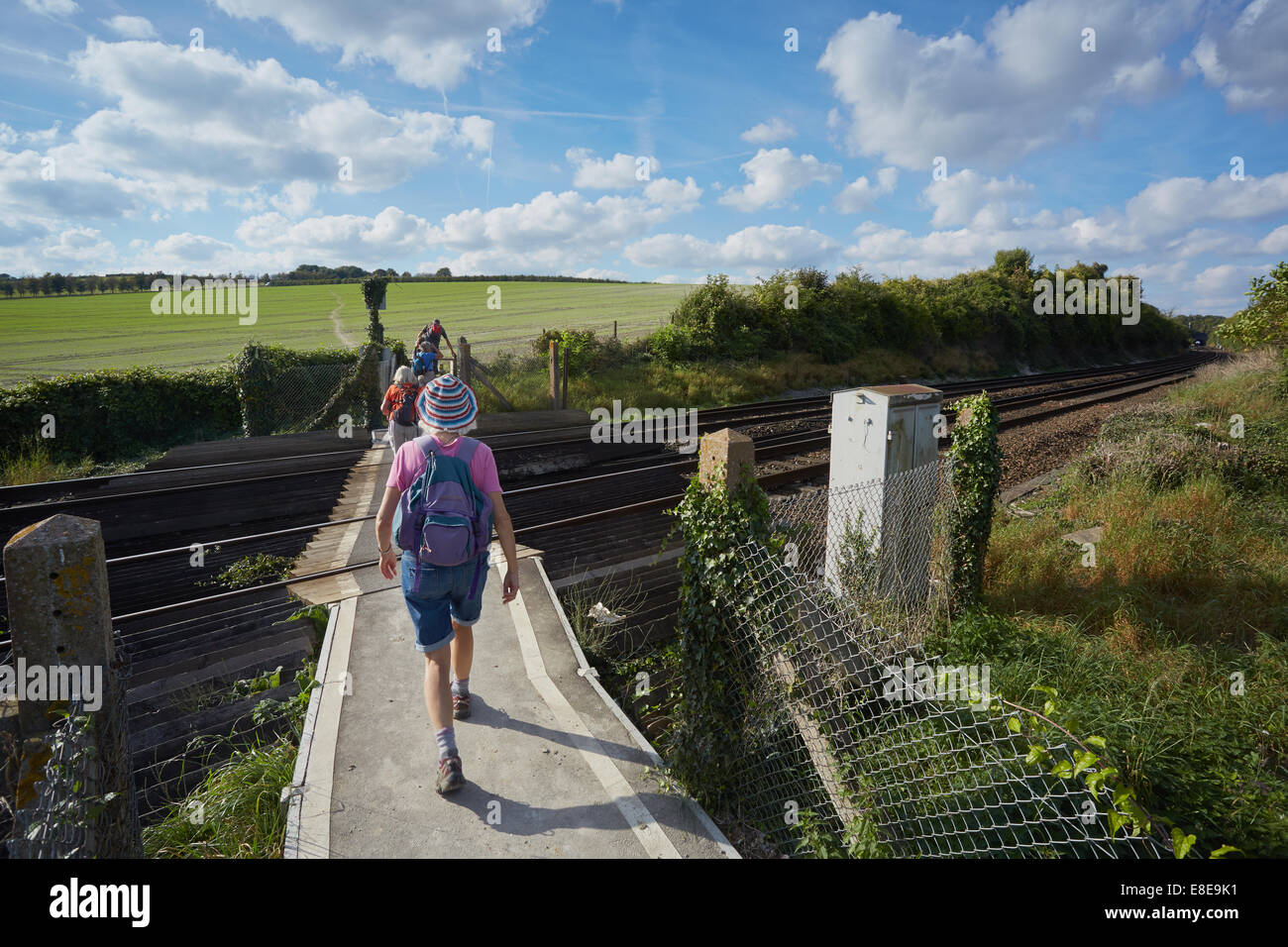Walkers Using A Railway Foot Crossing Near Eynsford Kent UK Stock 