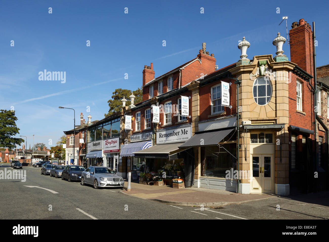 Shops and businesses on Ashley Road in the centre of Hale village Greater Manchester UK Stock Photo