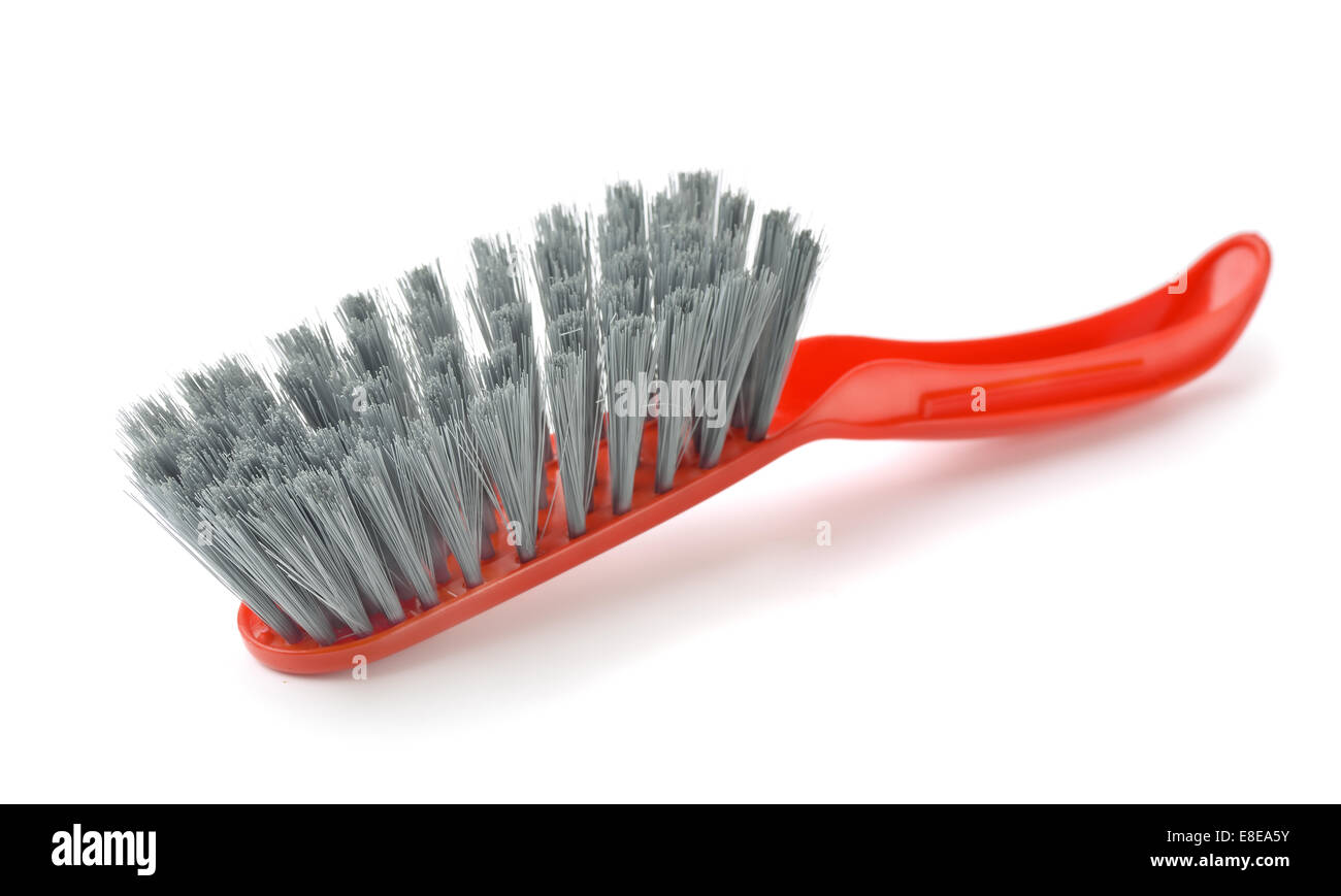 Red plastic cleaning brush isolated on white Stock Photo