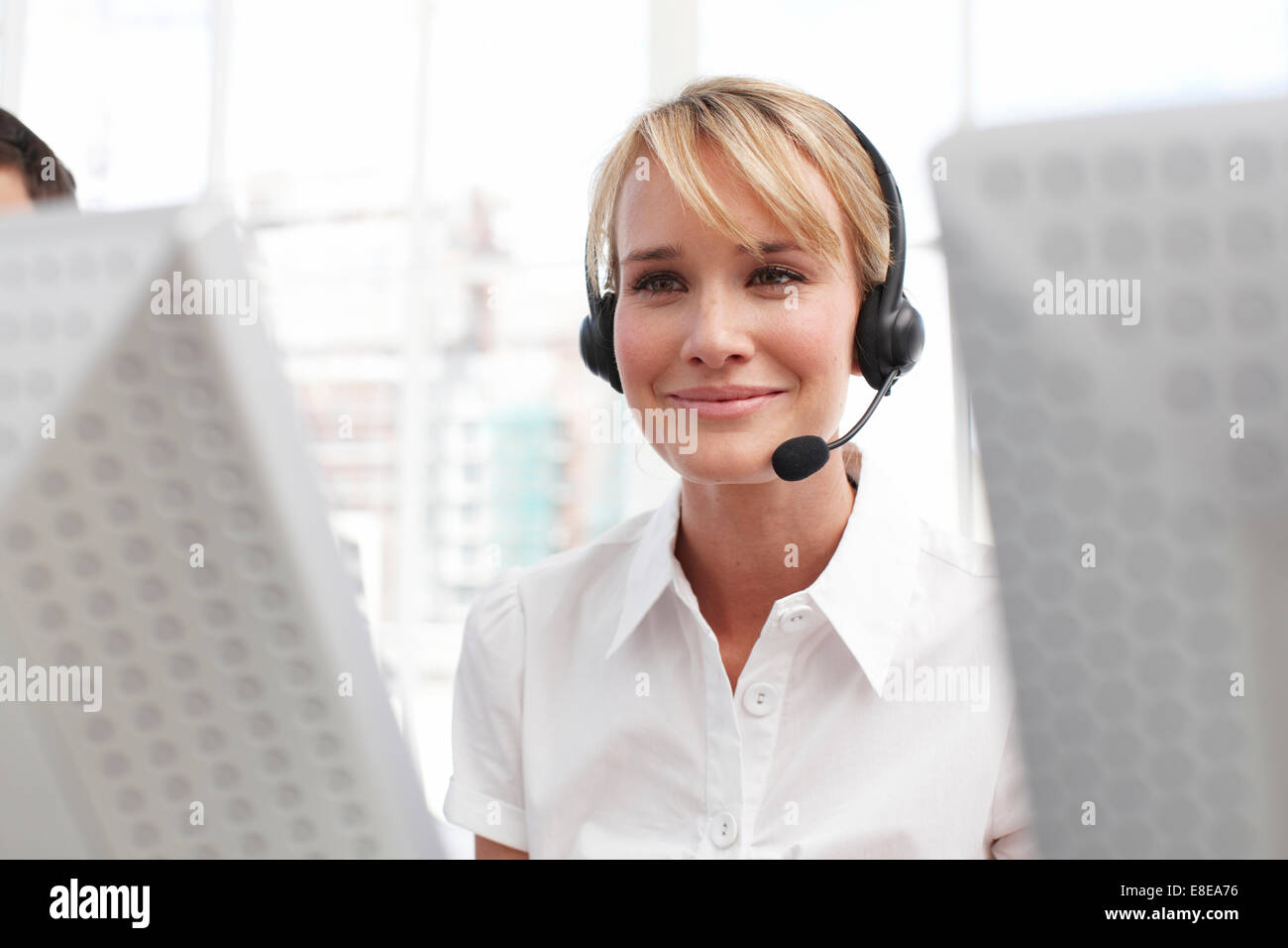 Beautiful customer support agent Stock Photo Alamy