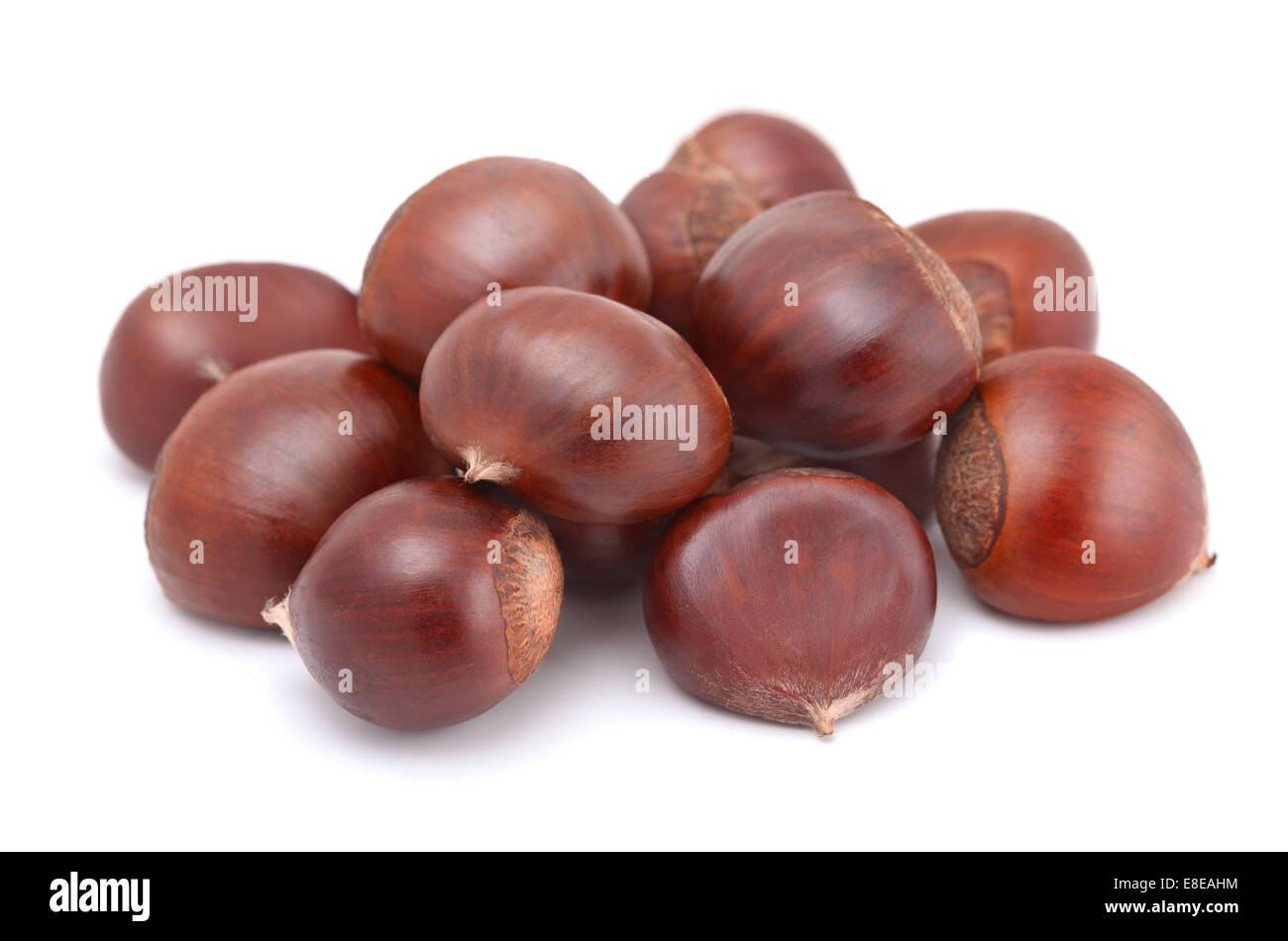 Fresh chestnuts isolated on white Stock Photo