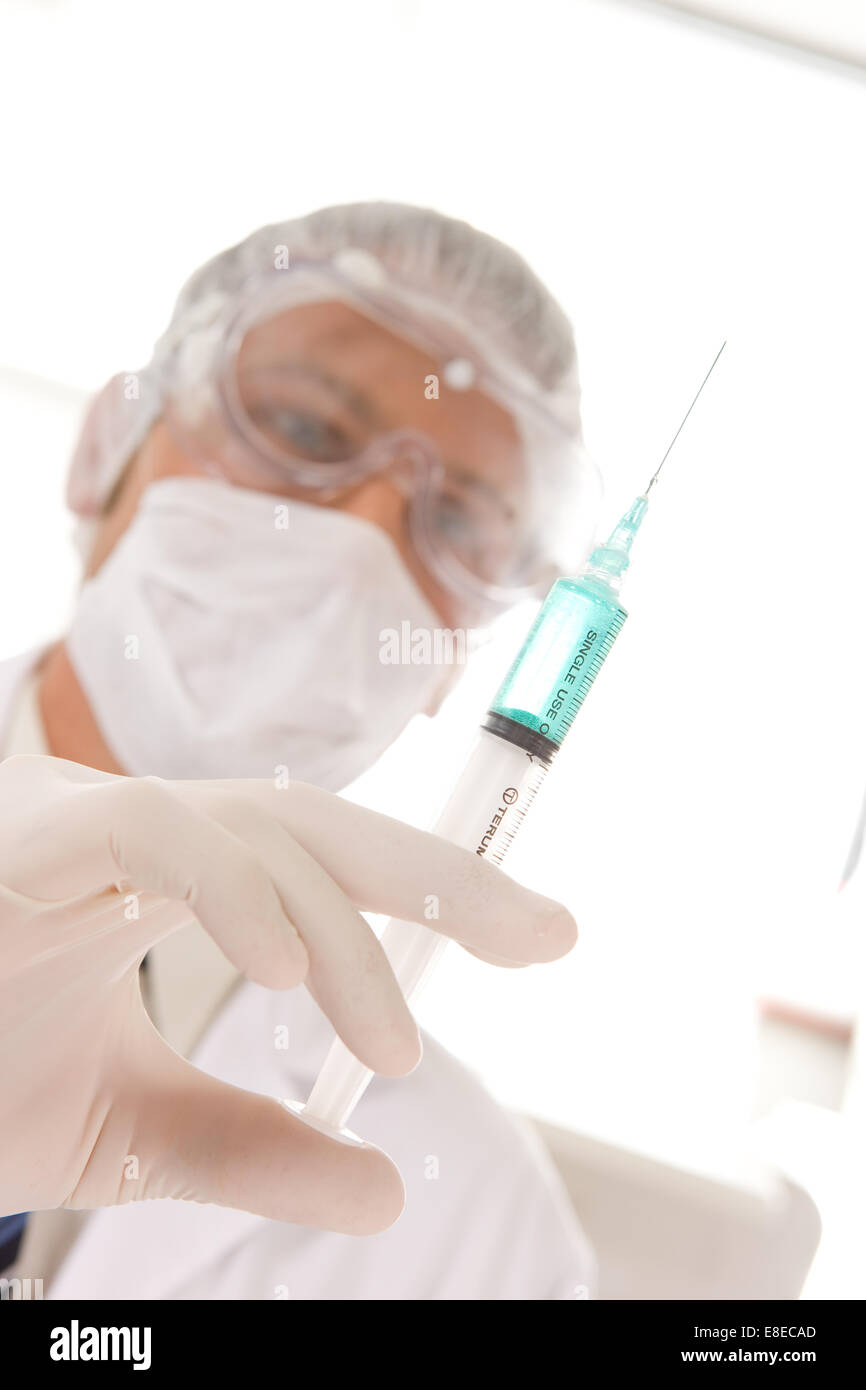 Doctor with a syringe Stock Photo