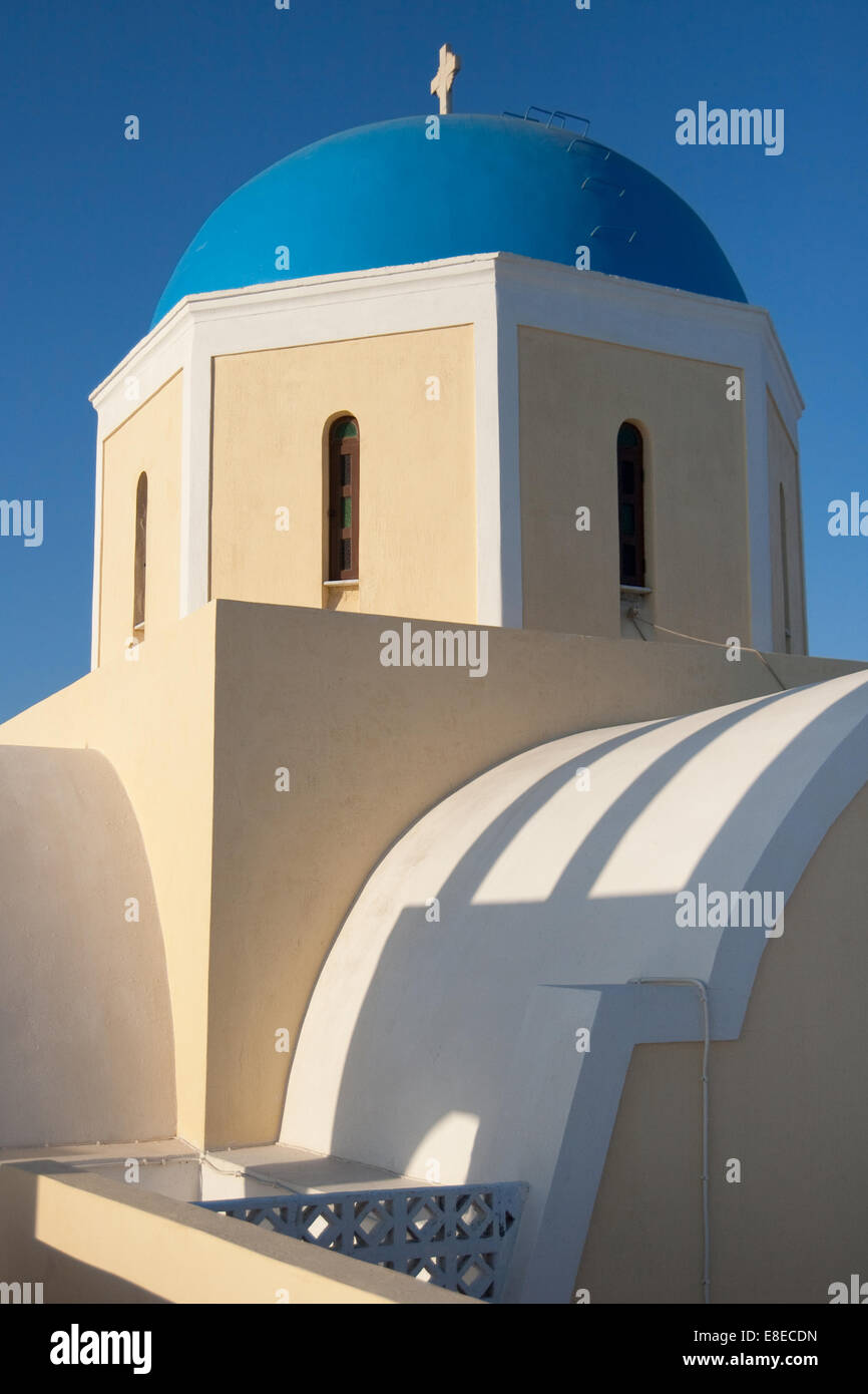 Blue dome of the greek orthodox Agios Georgios church in Oia, Santorini island, Greece. Stock Photo