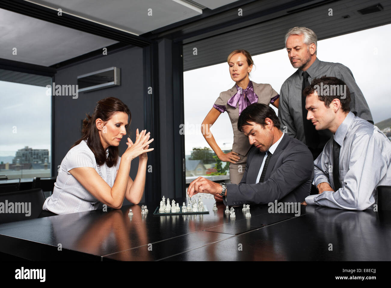 Business team playing chess Stock Photo