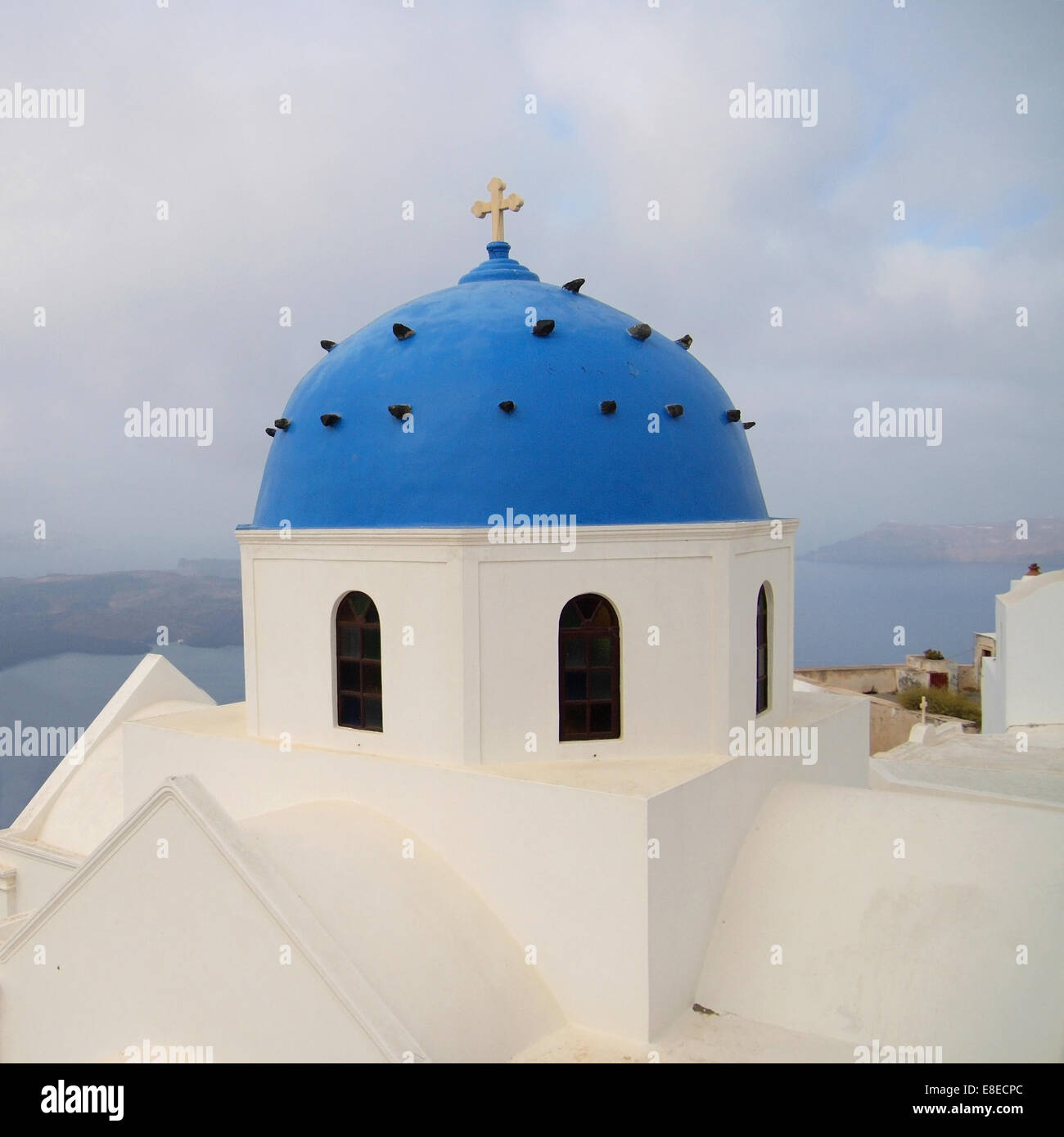 Blue dome of an orthodox church of Imerovigli, Santorini island, Greece. Stock Photo