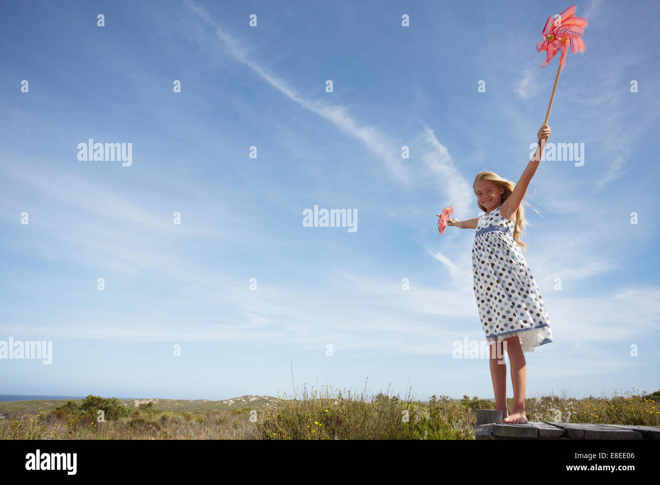 Little girl in the fields Stock Photo - Alamy