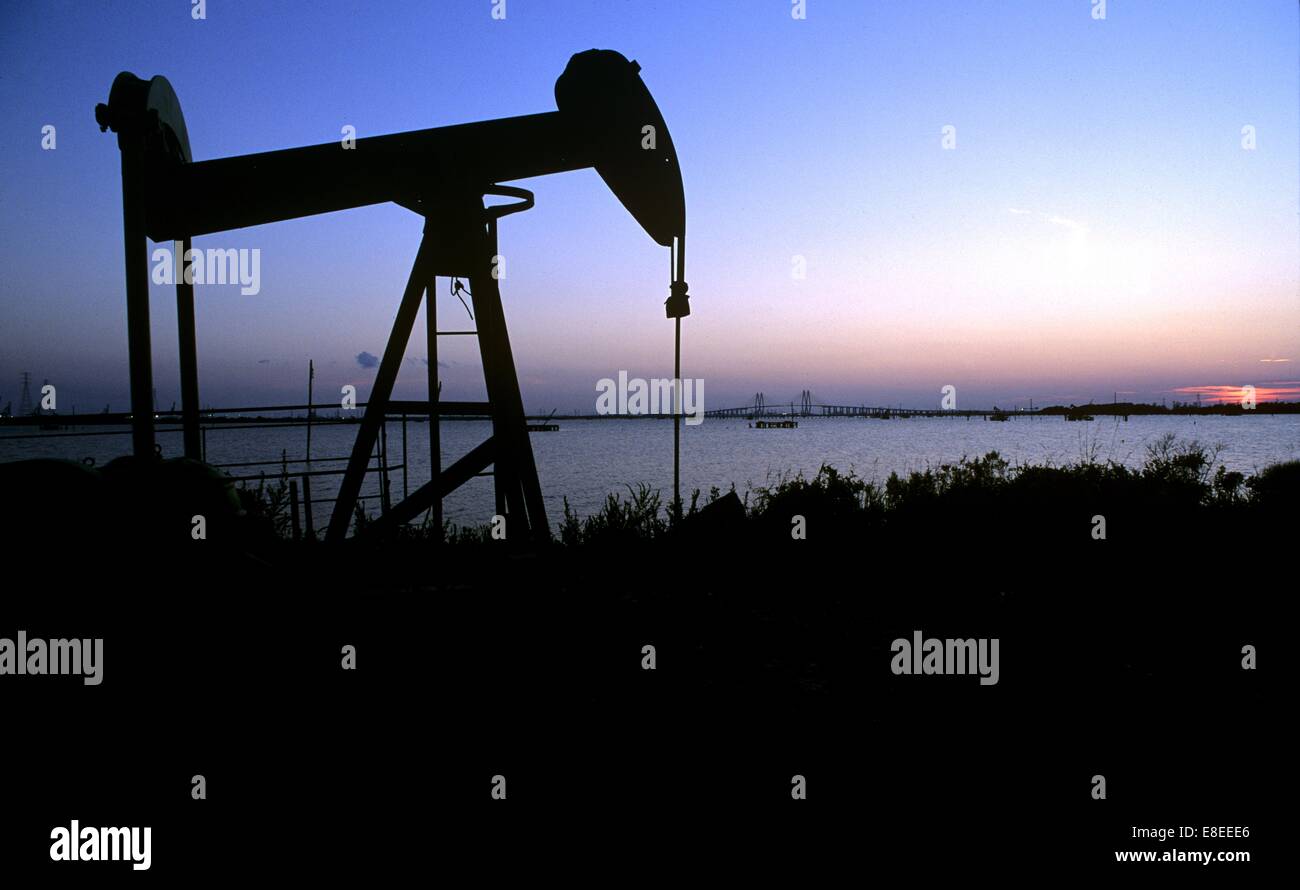 Pump Jack with Houston Ship Channel and Fred Hartman Bridge in Background Stock Photo Alamy