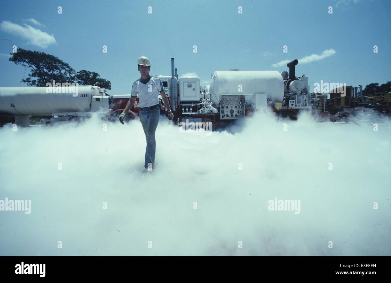 Oilfield Worker Conducting Hydraulic Fracturing Operation Stock Photo
