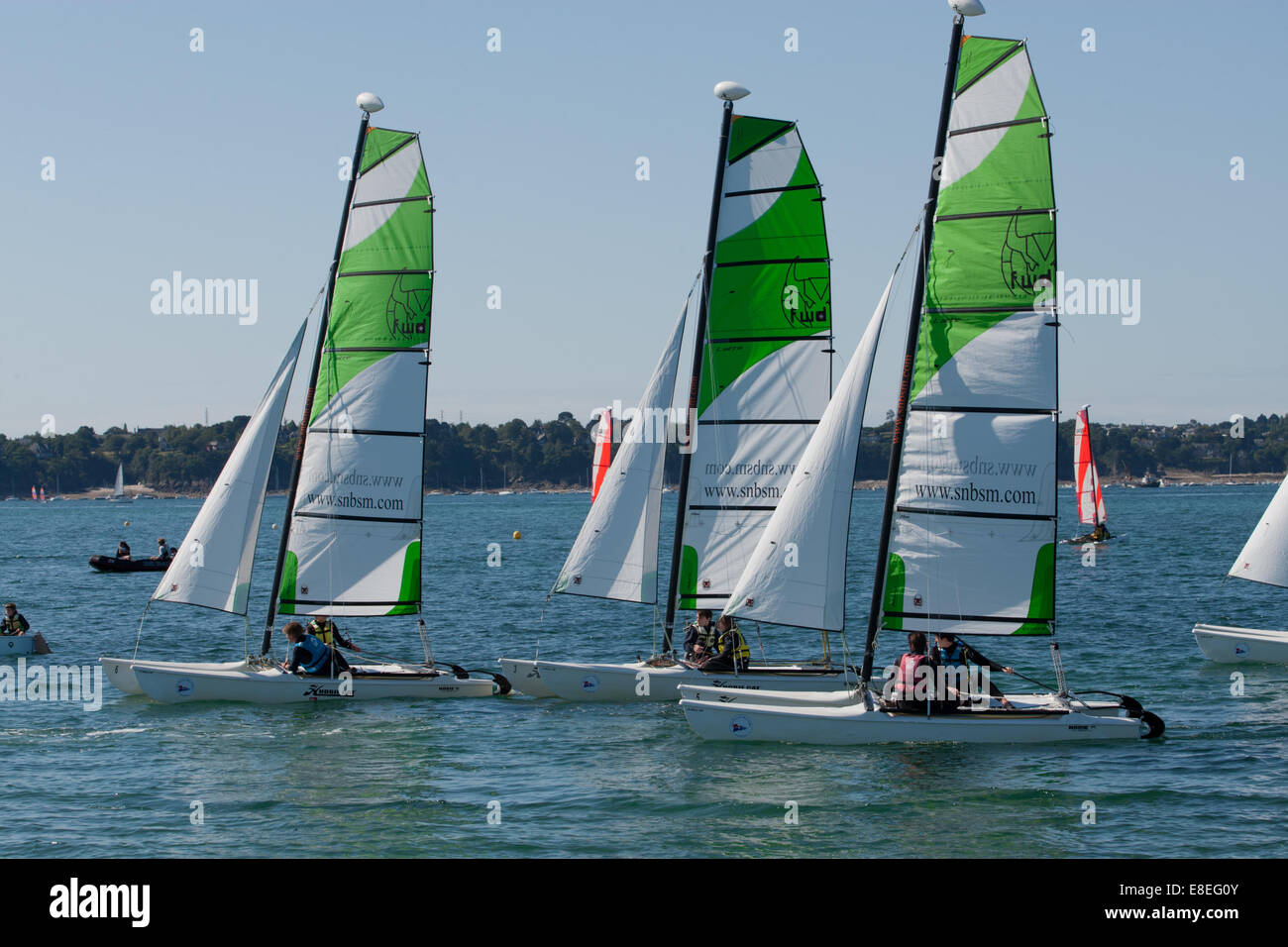 Training dinghies on the shore St Malo, at a boating and sailing course