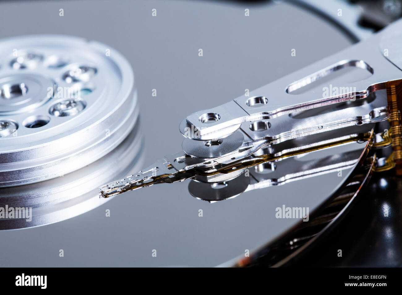 Hard Drive Mechanism and Details of the Platters, Arm and Spindle. Stock Photo