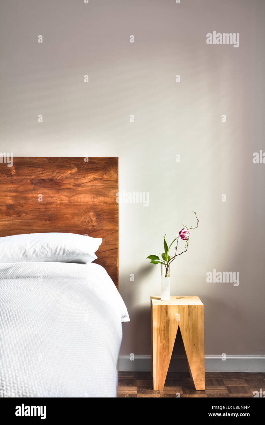 Beautiful Clean and Modern Bedroom with empty wall to add some text, logo, image, etc. Stock Photo