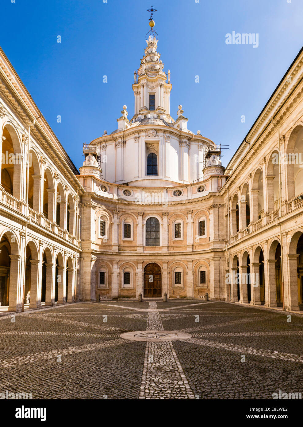 Courtyard of Studium Urbis, Cortile della Sapienza, Palazzo della Sapienza, and the baroque church of Sant'Ivo alla Sapienza by Stock Photo