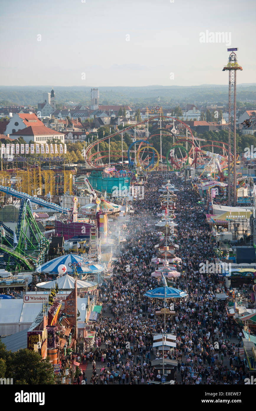 Rides on the fairground road with Olympia Looping, Fünferlooping roller coaster, Oktoberfest, Theresienwiese, Munich Stock Photo