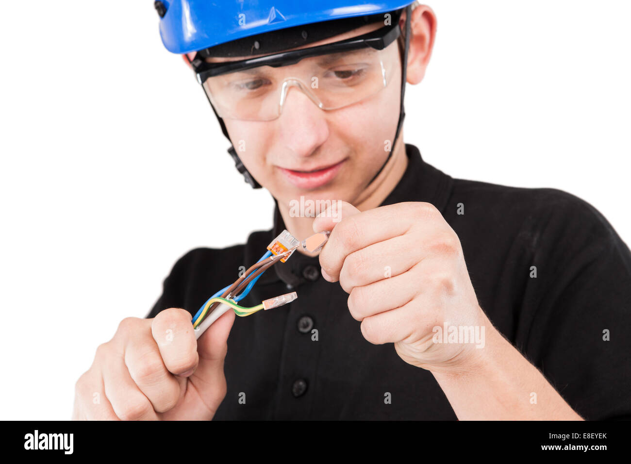 Male serviceman working with cables. Stock Photo