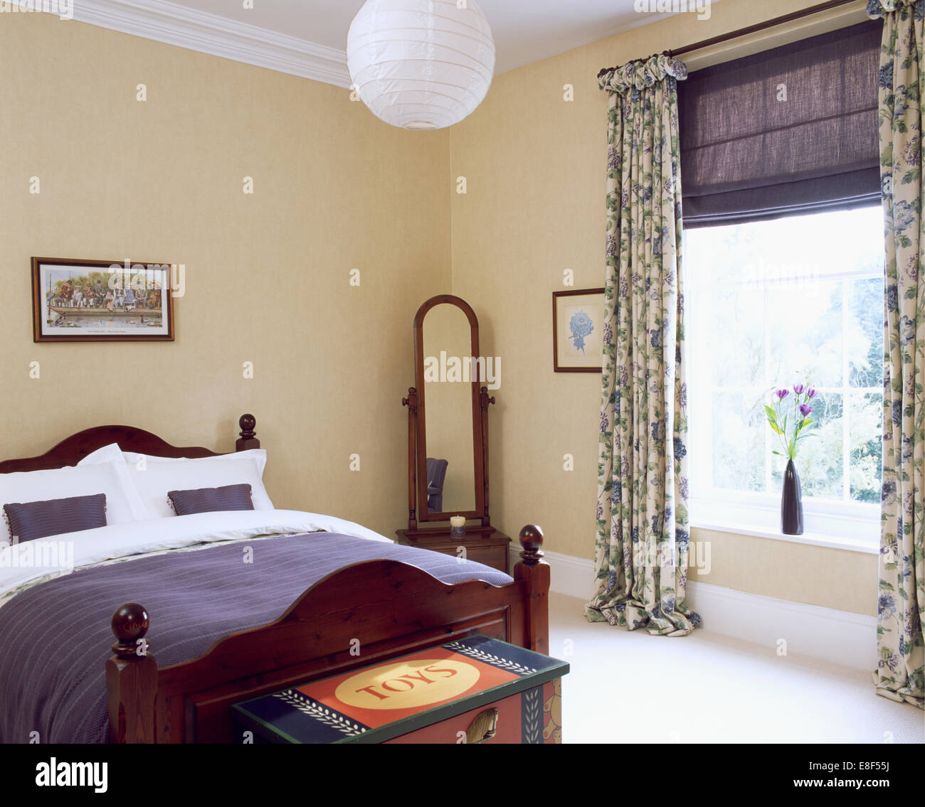 Japanese Paper Shade On Ceiling Light In Bedroom With Cheval