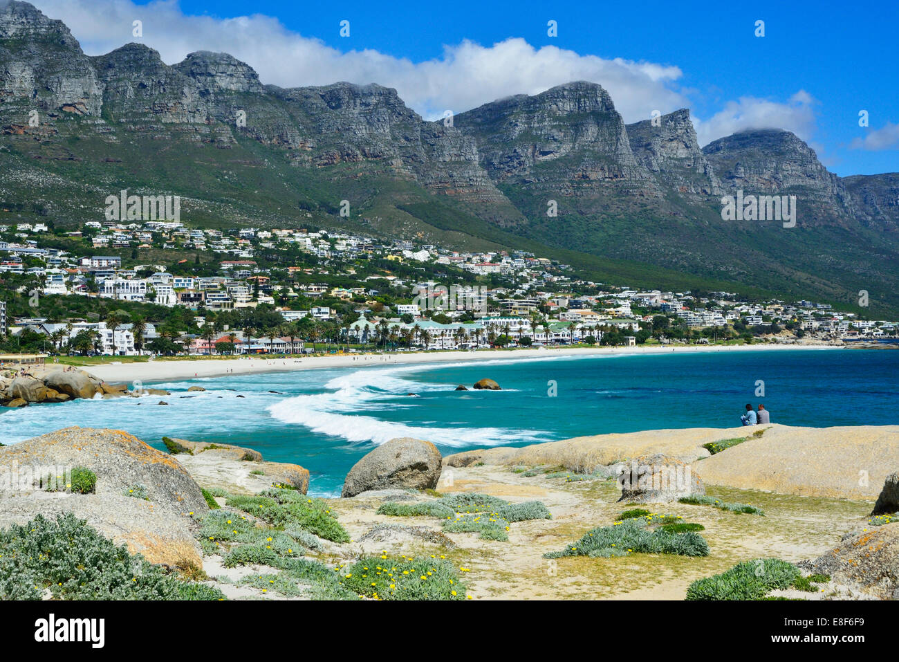 Springtime image of Camps Bay with Twelve Apostle mountains as a backdrop Stock Photo
